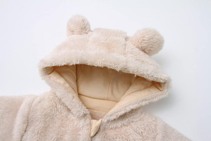 Comfortable baby winter wear: hooded fleece-lined romper for newborns.