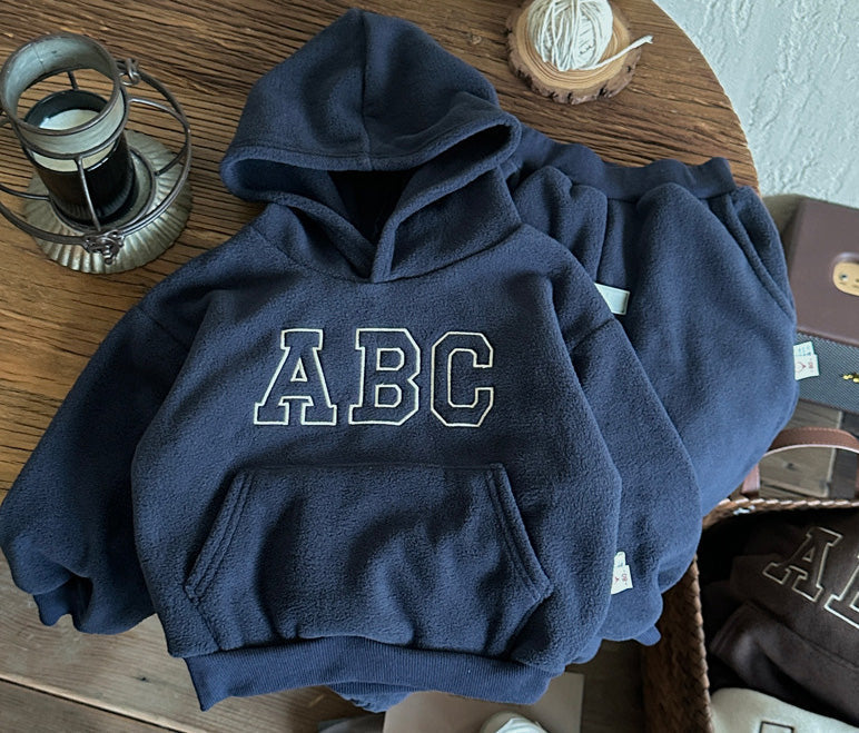 Cozy kids' winter clothing set with fur-lined hoodie & pants, perfect for boys & girls cold weather adventures.