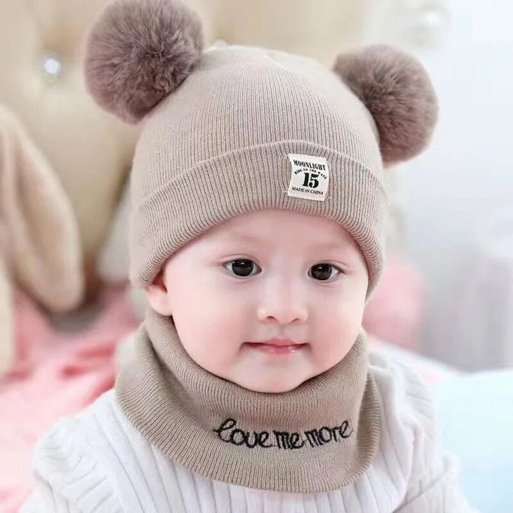 Kids' cozy pom-pom winter hat, perfect for outdoor play. Warm knit beanie for stylish boys & girls.