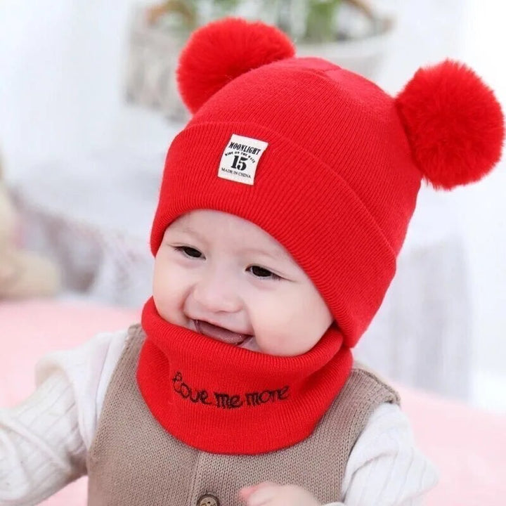 Stylish children's pom-pom winter hat. Knit beanie offering cozy warmth for kids, toddlers, boys, and girls.