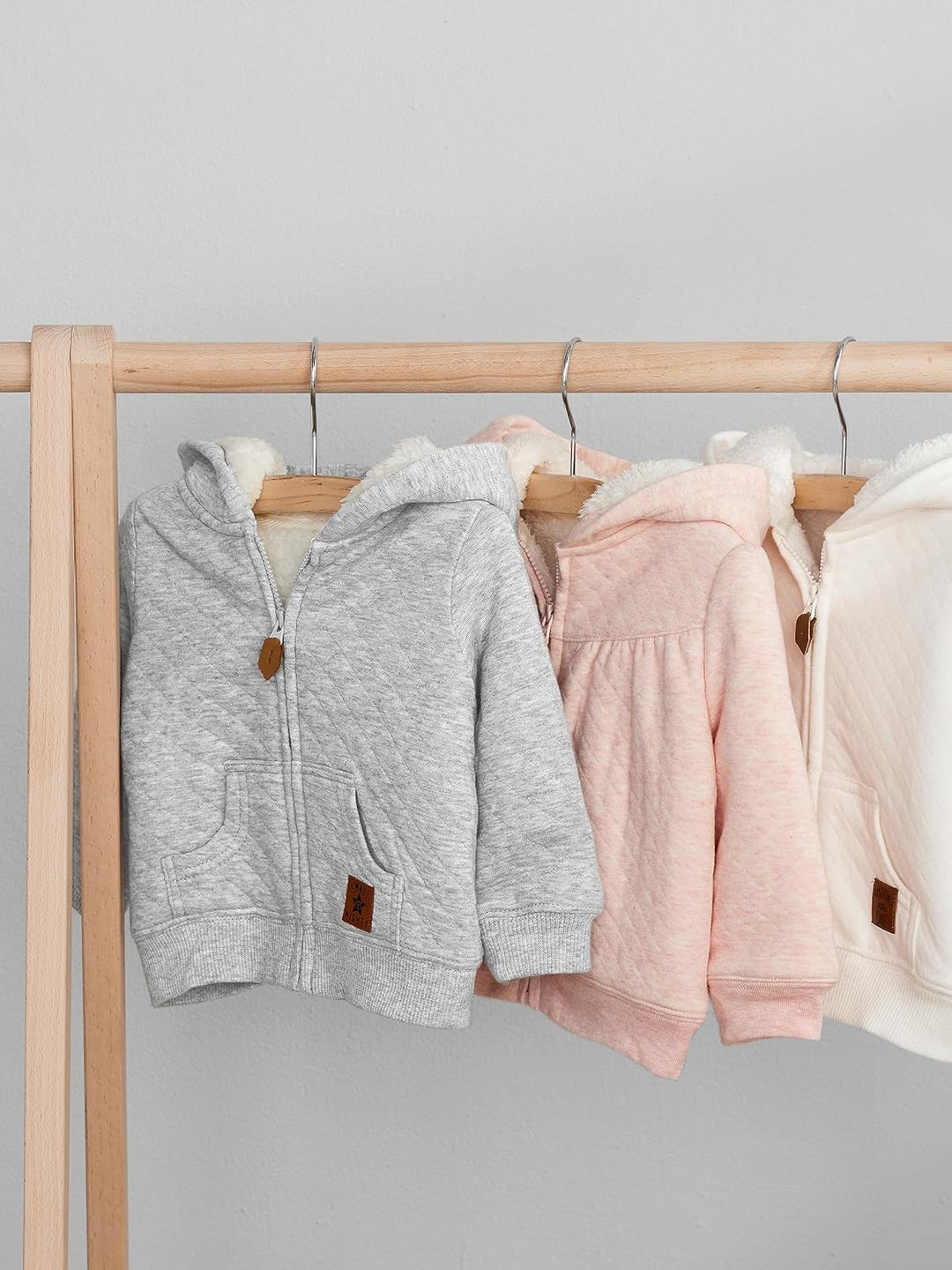Plush lined baby hoodie, a snug & warm hooded sweater for infants. Cozy winter fashion for toddlers.