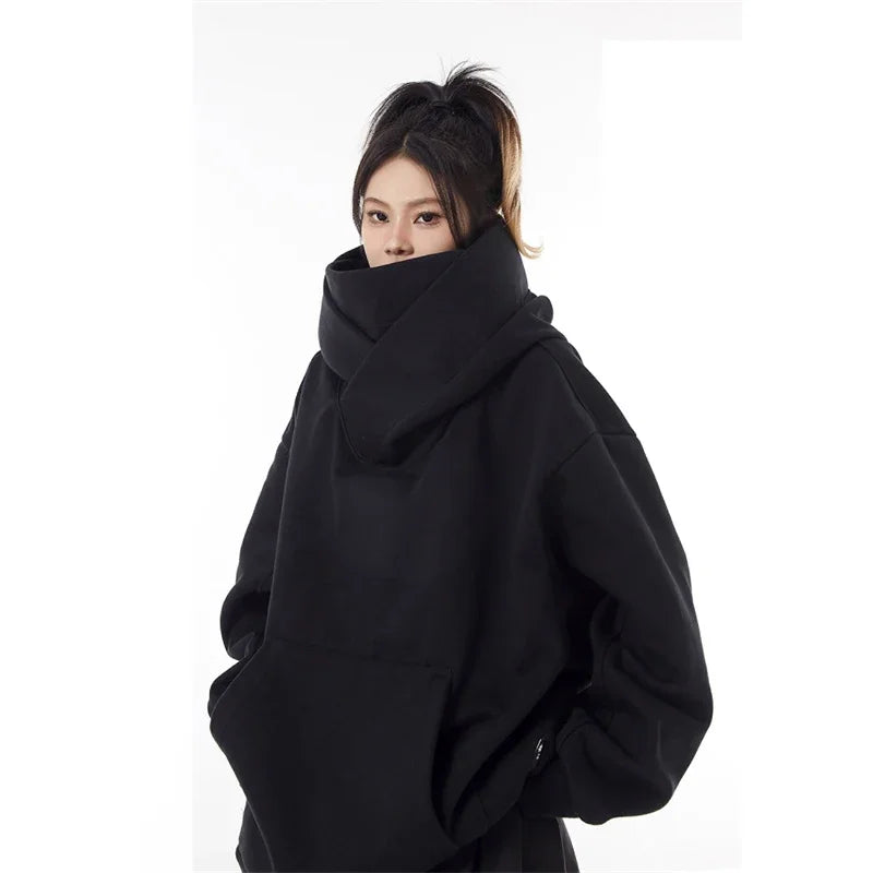 Warm oversized pullover hoodie for women, offering a cozy relaxed fit for winter comfort.