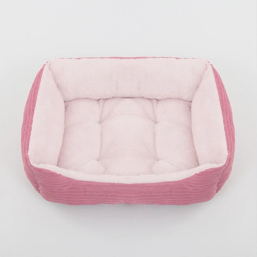 Washable plush dog bed ensures ultimate comfort & hygiene for your beloved pet.