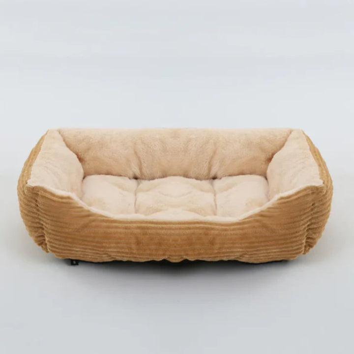 Deep-cushioned pet bed, ultra-soft plush, providing cozy comfort for dogs & cats.