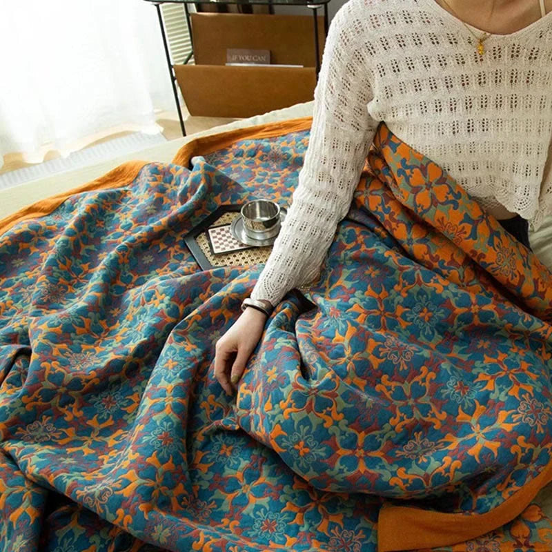 Soft cotton duvet quilt featuring a modern orange and blue pattern. Perfect for cozy bedroom comfort.