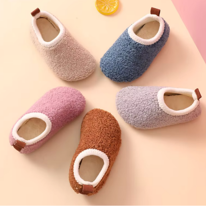 Cozy warm children's house slippers, perfect for indoor comfort. Soft, non-slip sole for safe play.