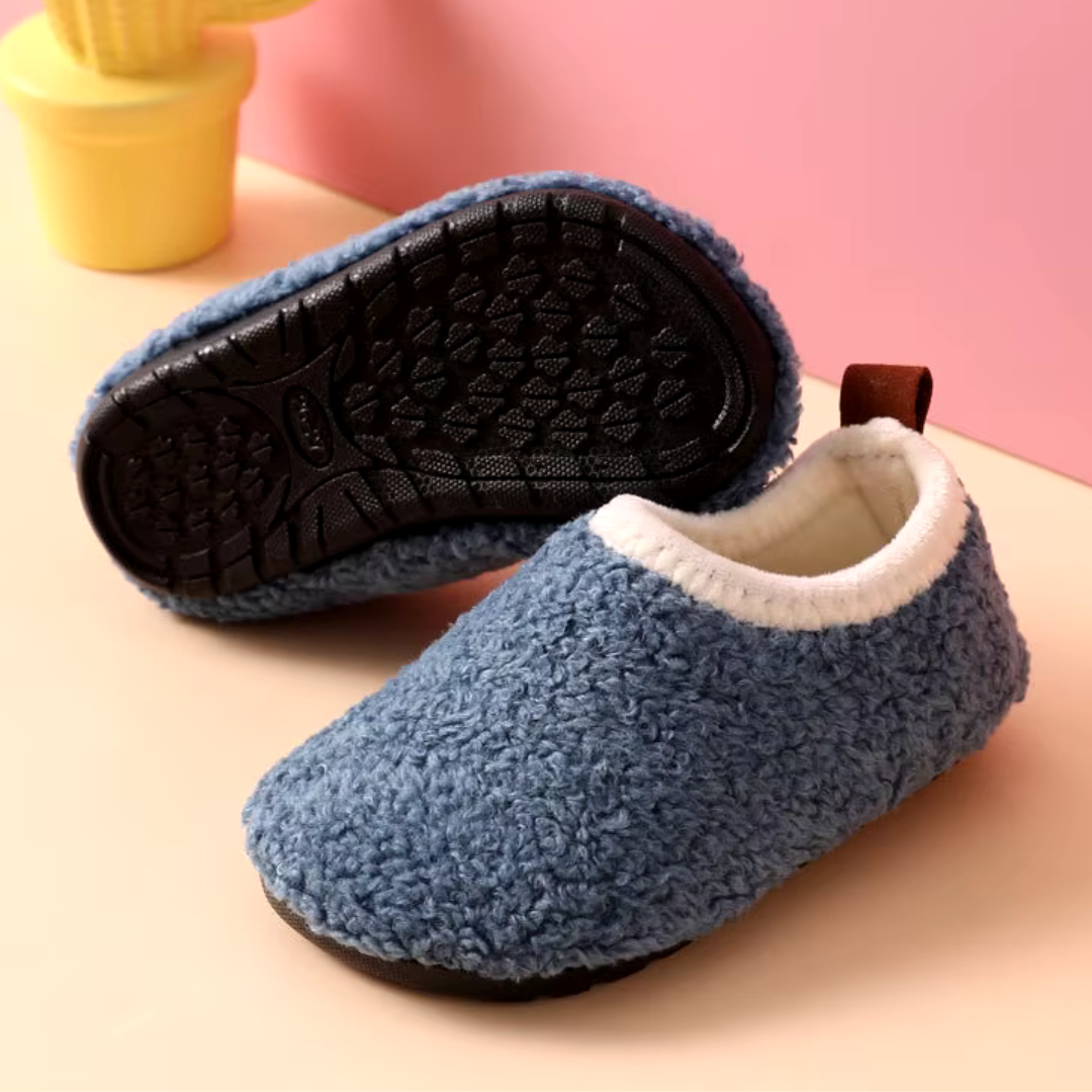 Unisex warm kids slippers. Plush, non-slip house shoes providing cozy comfort for all children.