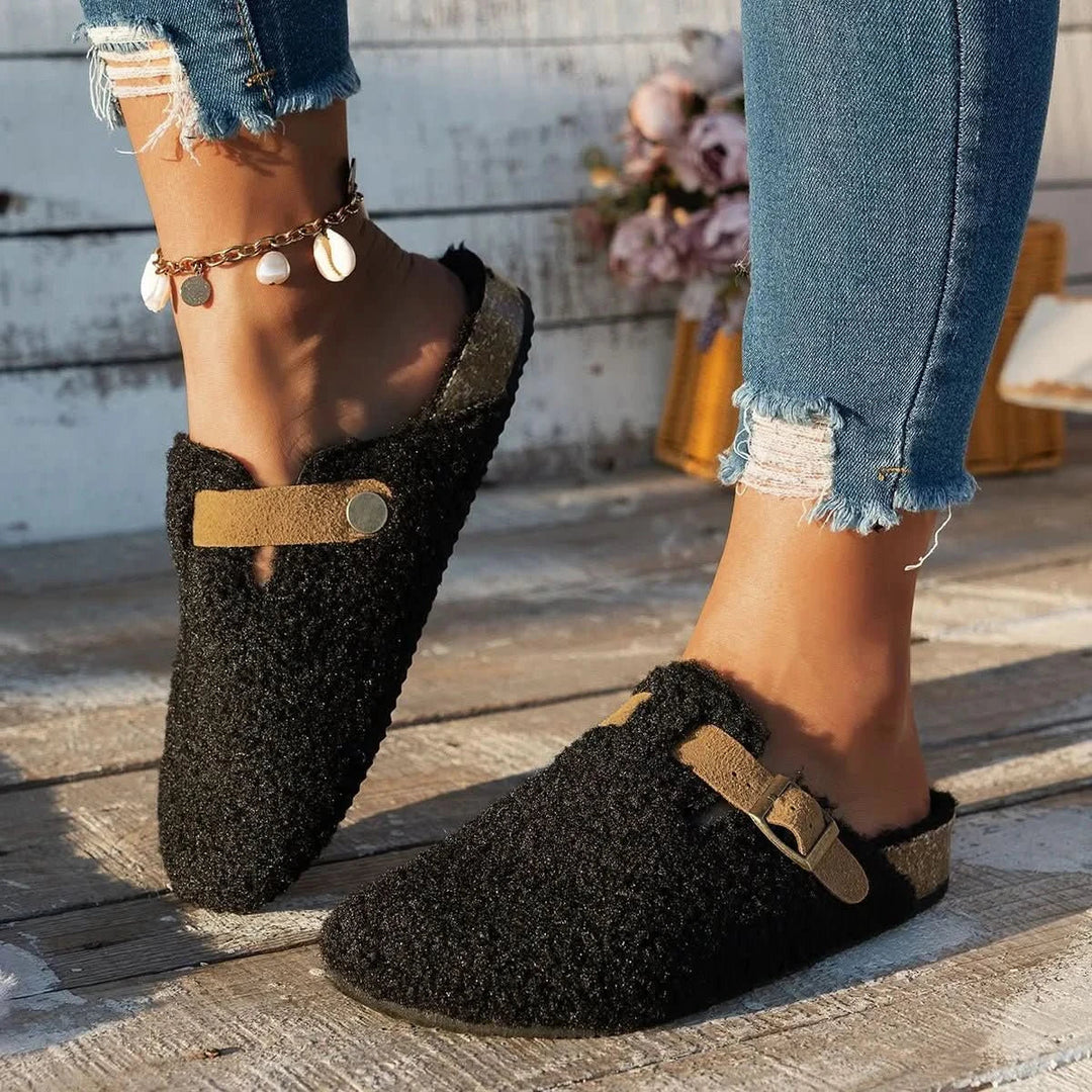 Chic women's slip-on mules, provide ultimate winter warmth & stylish comfort.