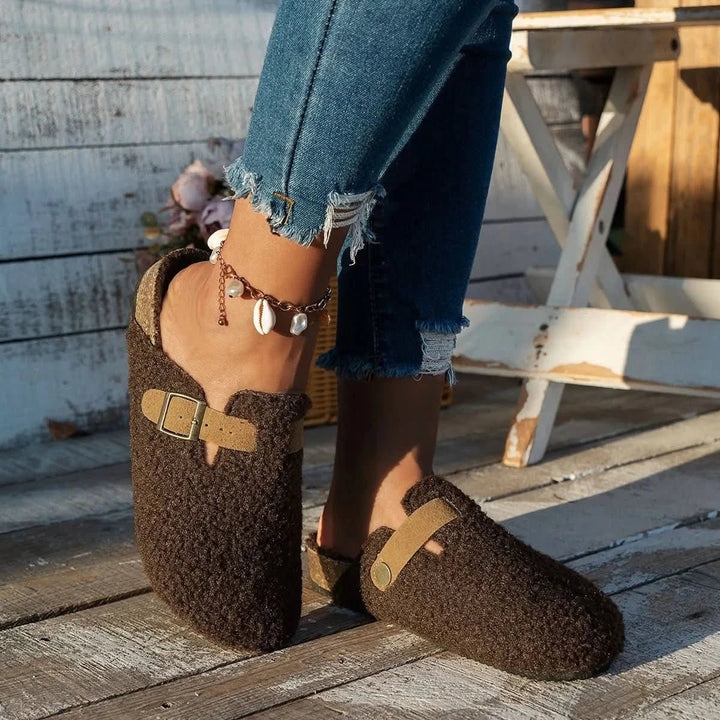 Women's cozy warm slip-on mules, versatile as slippers or house shoes.