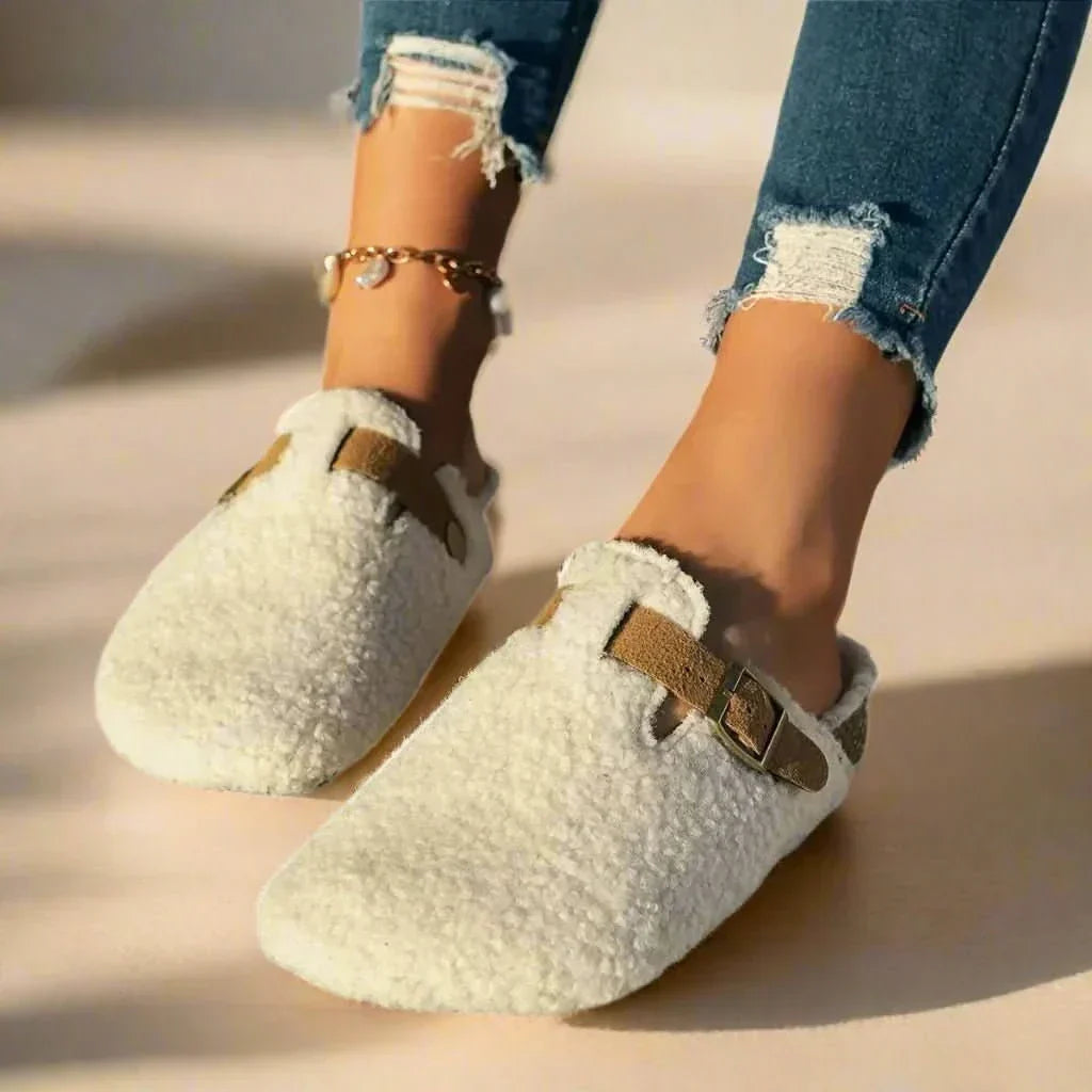 Women's warm slip-on mules, offering ultimate winter comfort for cozy feet.