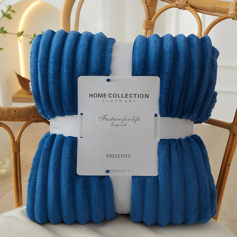Inviting wide striped flannel fleece throw, perfect for any cozy living space.