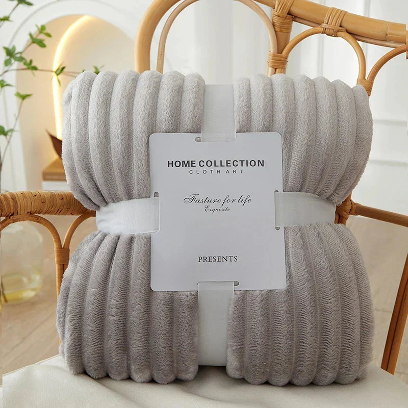 Soft, warm, and striped flannel fleece blanket for elegant home comfort.