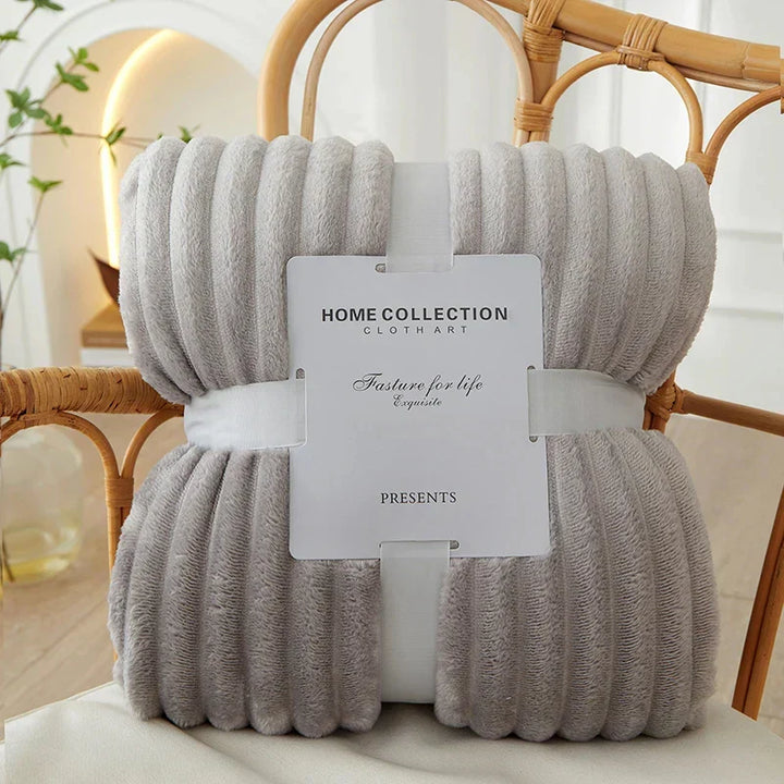 Soft, warm, and striped flannel fleece blanket for elegant home comfort.