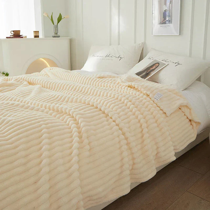 Plush wide striped flannel fleece blanket, designed for ultimate warmth and comfort.