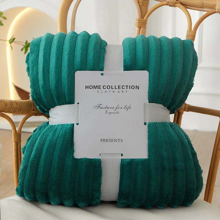 Decorative striped fleece throw for living room, a soft & warm home accent.