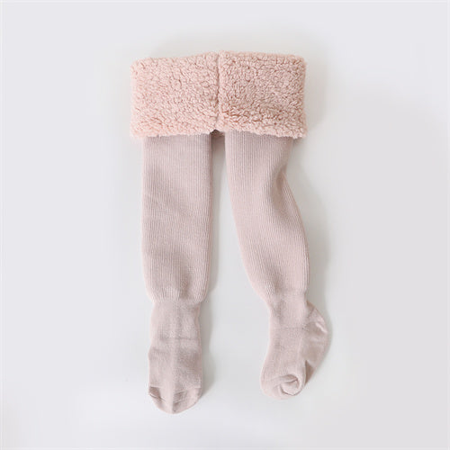Girls' cozy winter tights, perfect for active kids' cold weather play. Soft, elastic fit hosiery & toddler apparel.