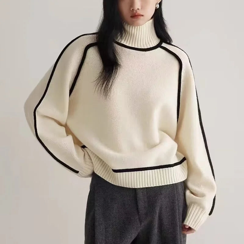 Elegant women's cream turtleneck knit sweater, providing warm winter comfort & sophisticated fall style.