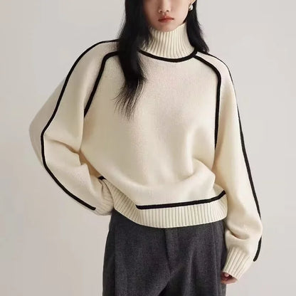 Elegant women's cream turtleneck knit sweater, providing warm winter comfort & sophisticated fall style.