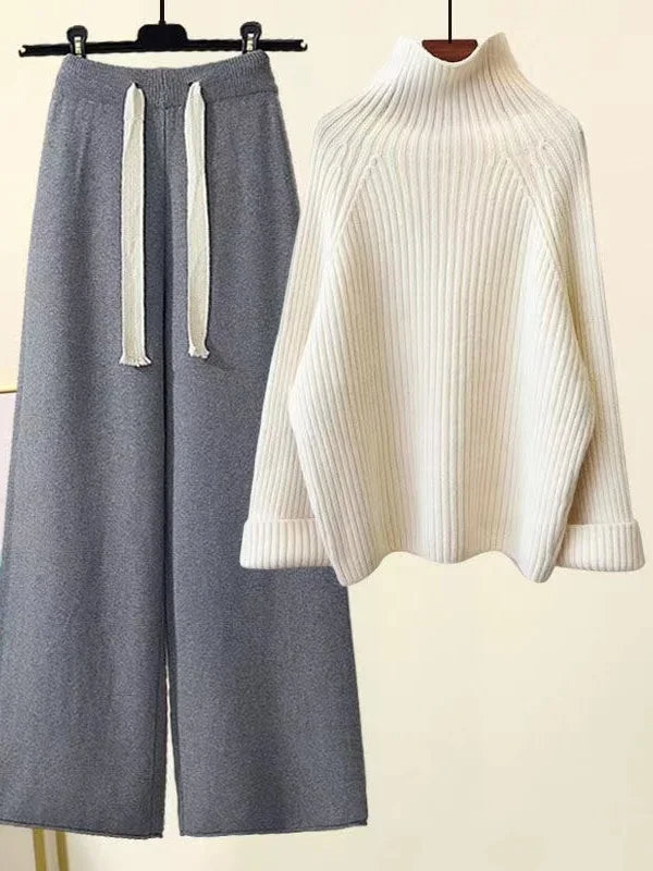 Relaxed fit women's knit lounge set. Stylish turtleneck and wide-leg pants for comfortable home wear.