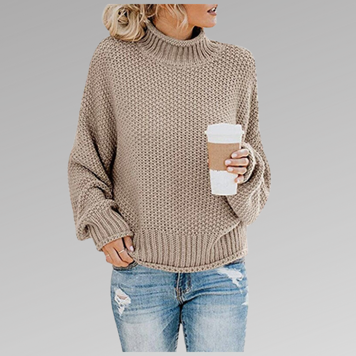 Women's oversized turtleneck sweater, chunky knit & cozy for ultimate fall/winter comfort & style.