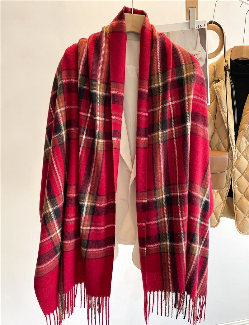Cozy women's plaid cashmere winter scarf. Warm, soft, and stylish checked accessory for cold weather.