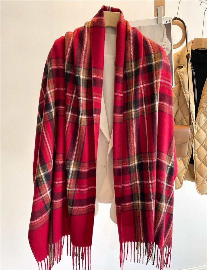 Cozy women's plaid cashmere winter scarf. Warm, soft, and stylish checked accessory for cold weather.