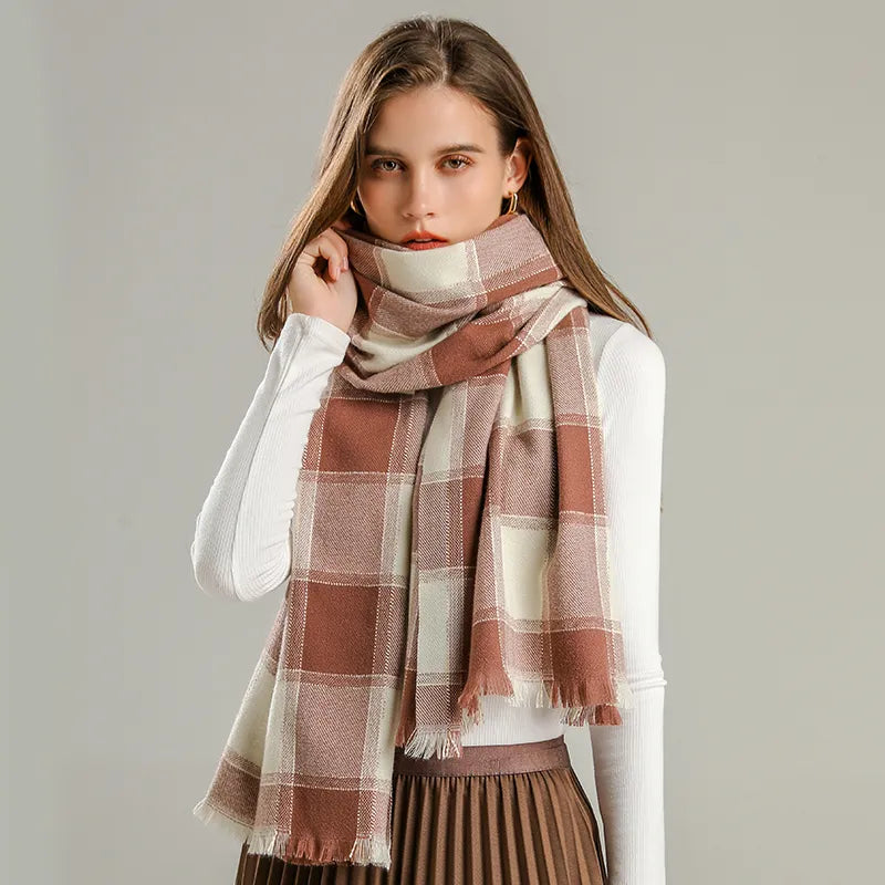 Fashionable women's plaid cashmere scarf. Cozy winter accessory with a classic checked pattern. Warm & stylish.