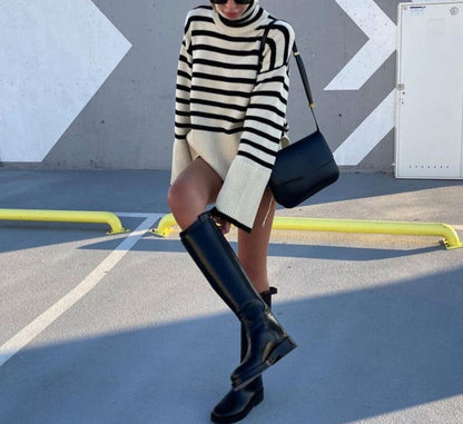Soft knit women's turtleneck sweater, a cozy long sleeve top ideal for comfortable fall and winter outfits.
