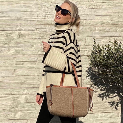 Chic women's turtleneck pullover, a comfortable and warm knit sweater for versatile cold-weather style.
