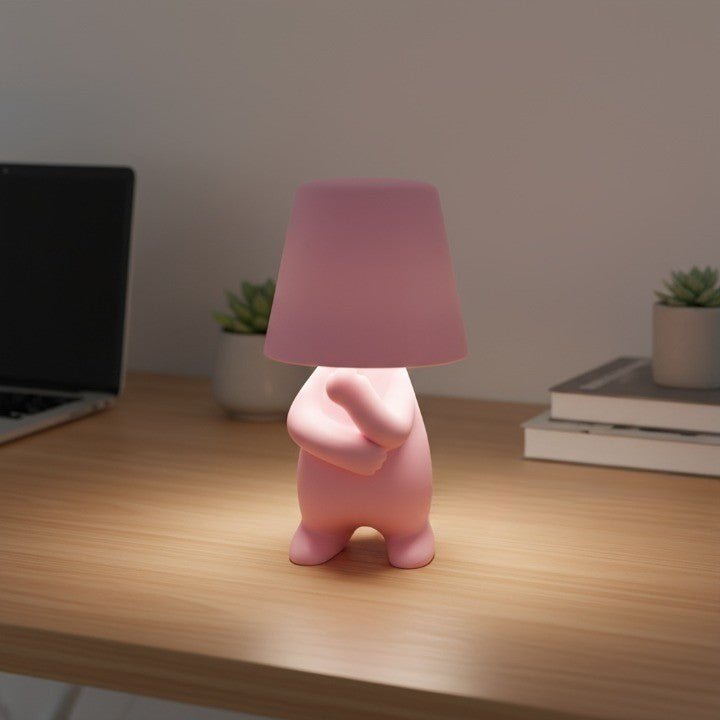 Artistic human-shaped LED lamp, casting warm mood lighting for any room.