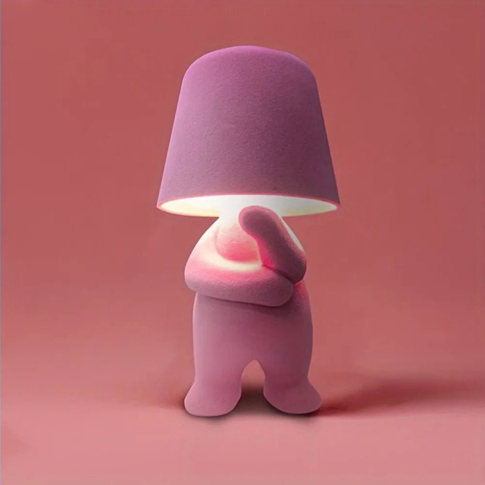 Modern human figure LED accent light, a creative table lamp for contemporary spaces.