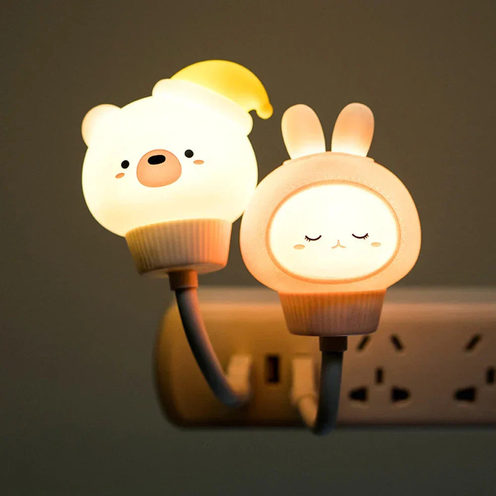 CuddleLight animal night light with timer function, perfect for nursery decor and cozy kids' room ambiance.