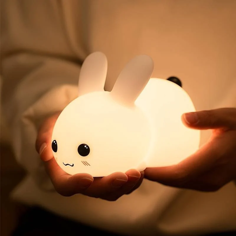 Cute bunny night light for children's peaceful sleep. Soft glow lamp, perfect for nursery & kids' room decor.