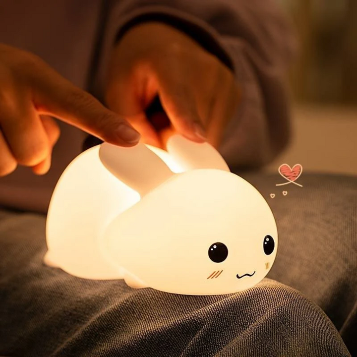 Calming SnuggleBunny night light helps kids sleep peacefully. Soothing soft glow, ideal for bedtime.