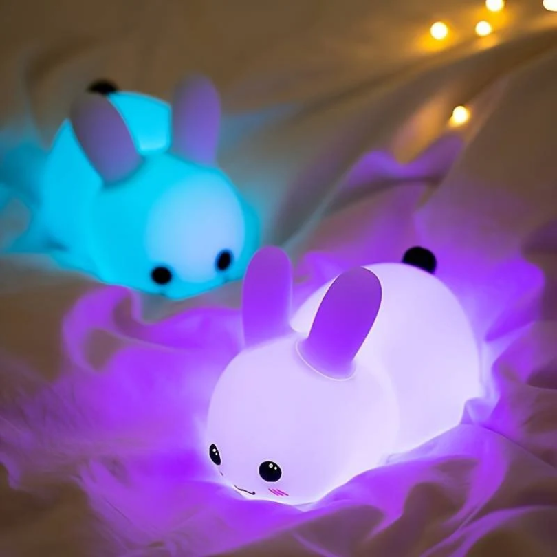Children's bunny night light, a gentle nursery decor lamp. Provides a soft, calming glow for sweet dreams.