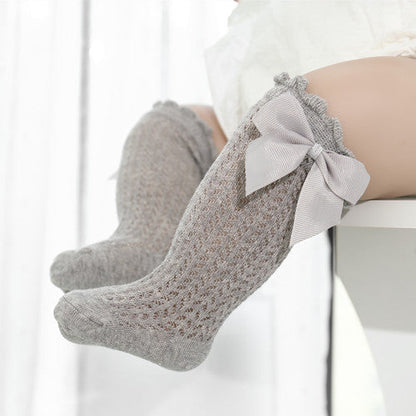 Perfect baby girl gift: charming large bow ankle socks. Soft cotton, cute design for infants & toddlers.