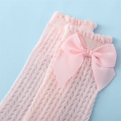 Comfy & cute baby girl large bow ankle socks. Soft cotton blend ensures happy little feet. Toddler fashion.