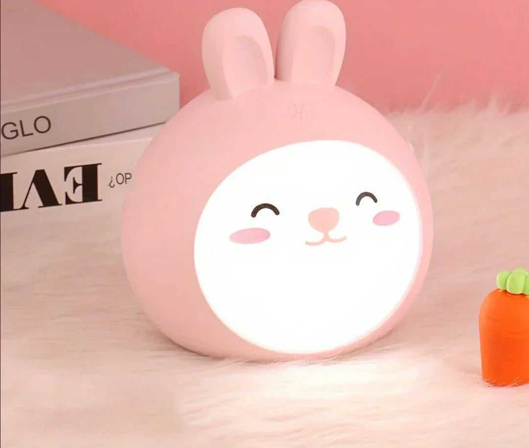 Cute CuddlePaw LED night light for kids, portable & battery-operated. Perfect nursery decor & sleep aid.