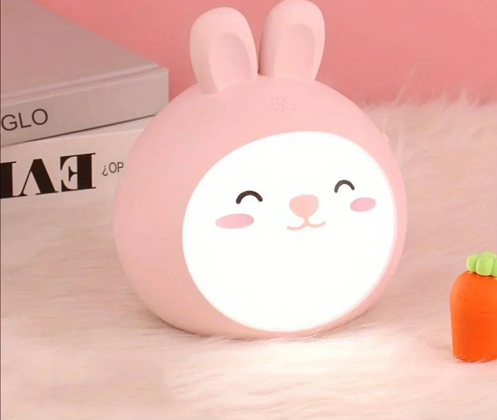 Cute CuddlePaw LED night light for kids, portable & battery-operated. Perfect nursery decor & sleep aid.