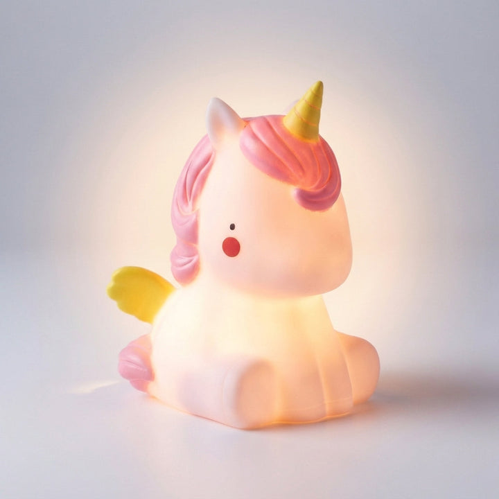 Nursery decor: Dreamasaur dinosaur LED night lamp, a cute animal light for a calm children's room.