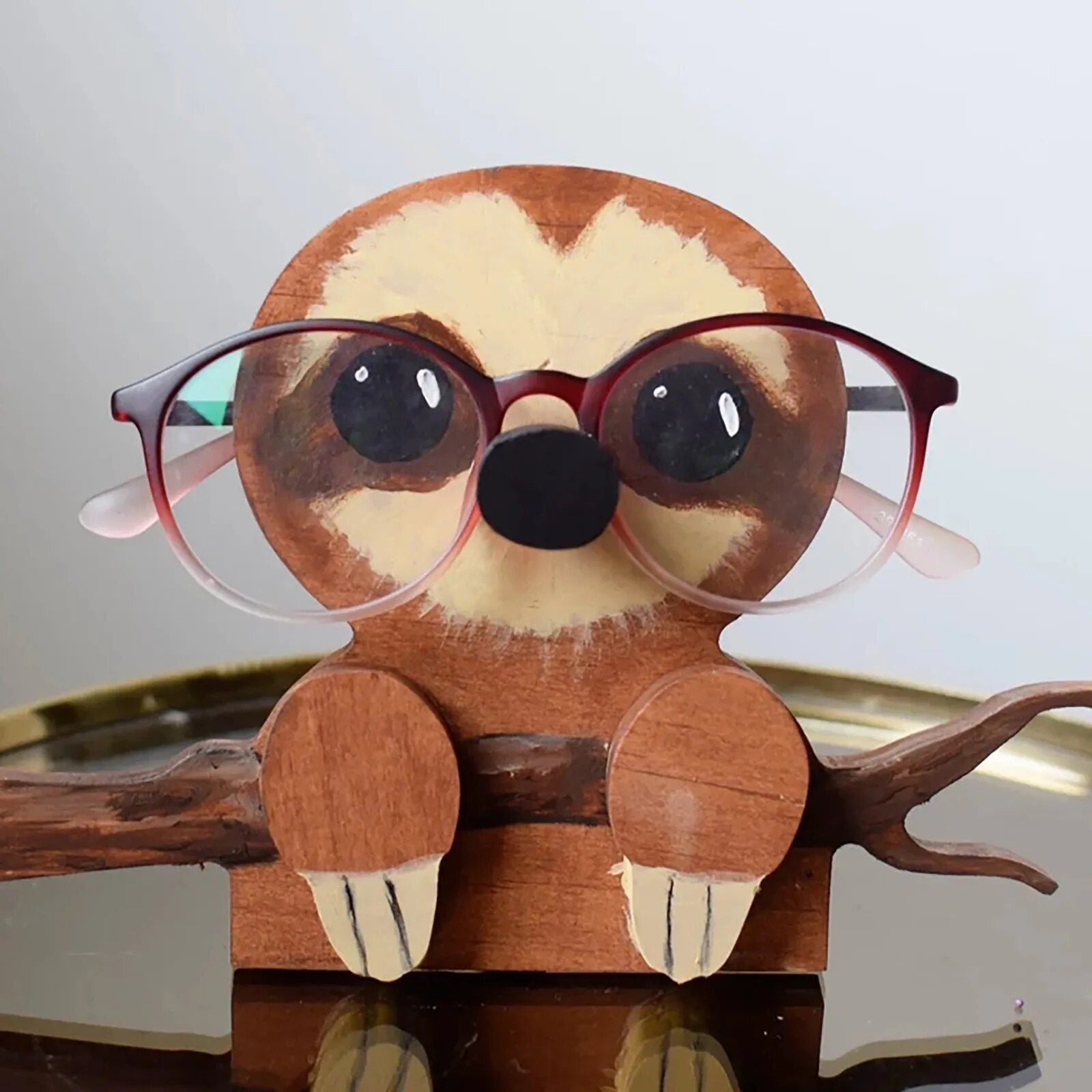 Unique animal spectacle holder, a cute wooden desk organizer and whimsical glasses stand.