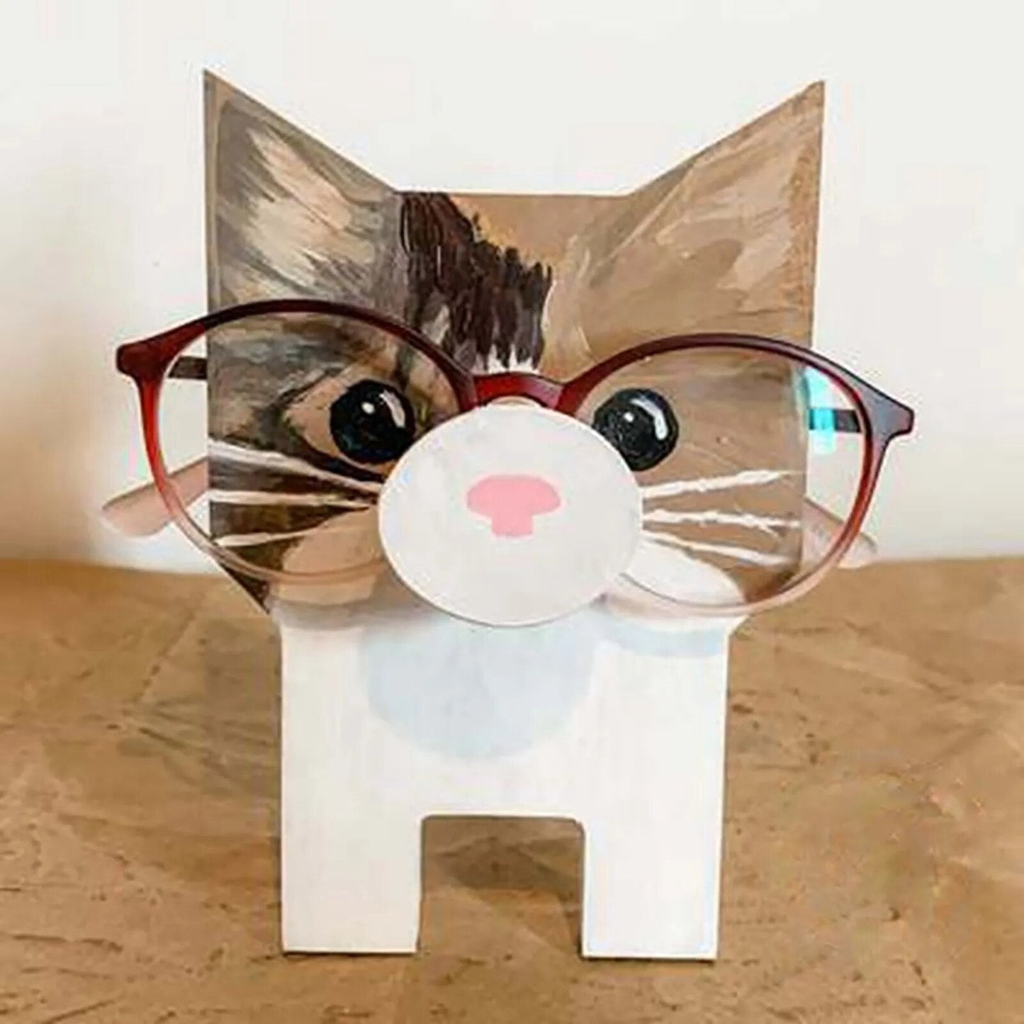 Decorative animal eyeglass stand, charming wooden holder for animal lovers & desk decor.