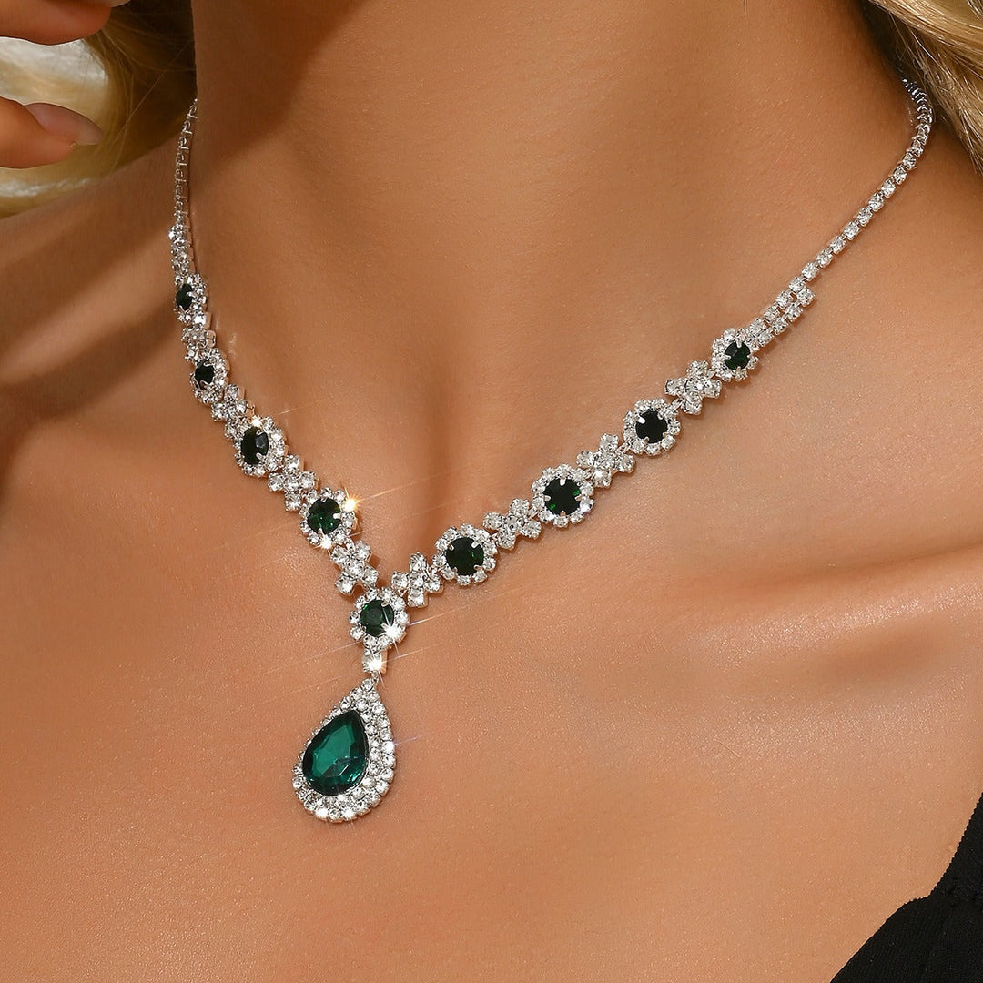 Womens sparkling waterdrop CZ pendant necklace, available in red, green, blue.