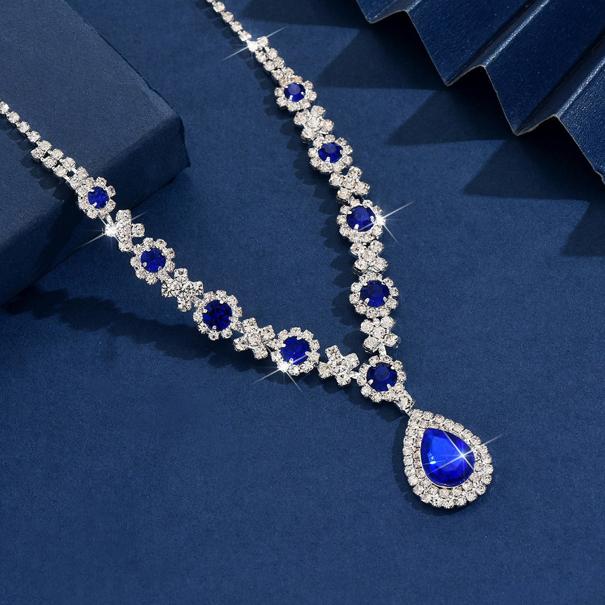 Delicate waterdrop CZ pendant necklace, sparkling women's dainty jewelry design.
