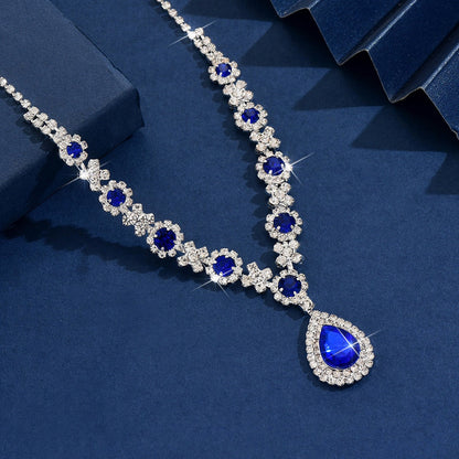 Delicate waterdrop CZ pendant necklace, sparkling women's dainty jewelry design.