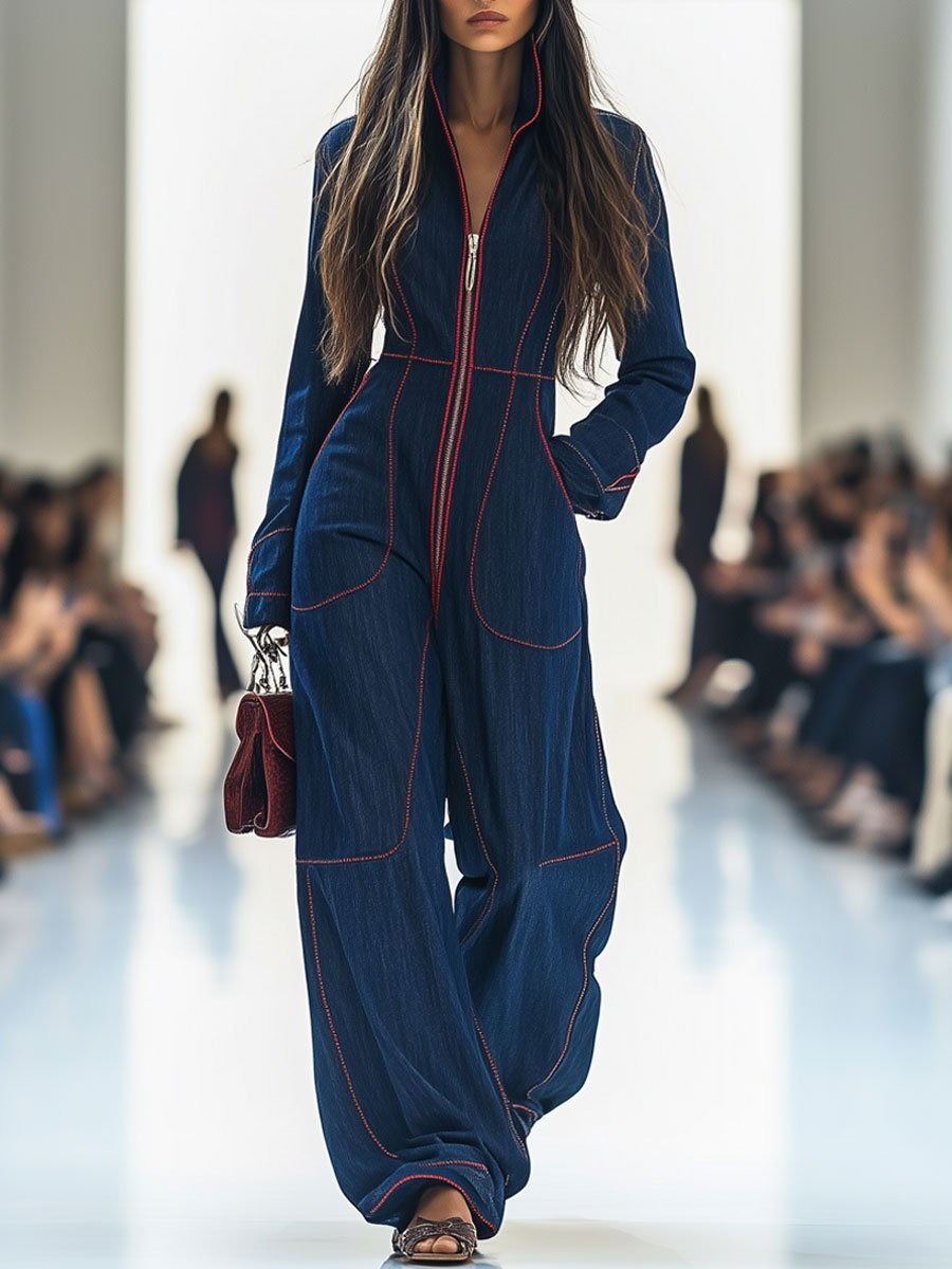 Dark blue women's wide leg jumpsuit with zip front for a chic, versatile, and modern look.