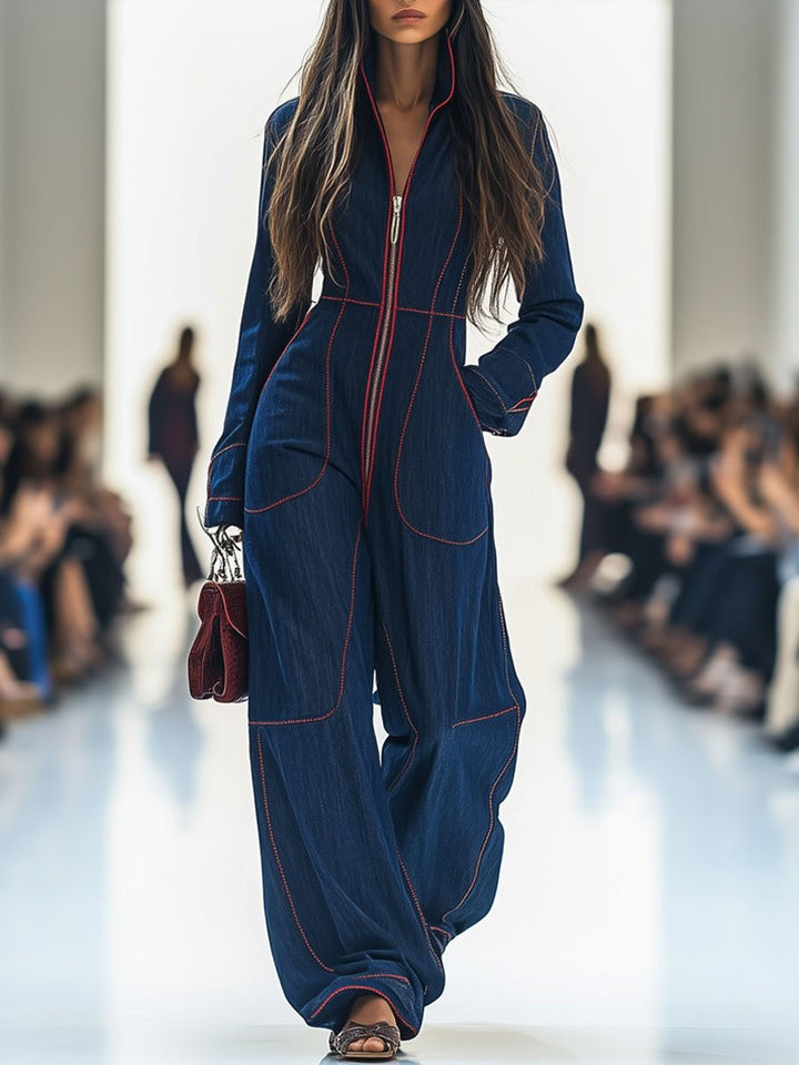 Dark blue women's wide leg jumpsuit with zip front for a chic, versatile, and modern look.