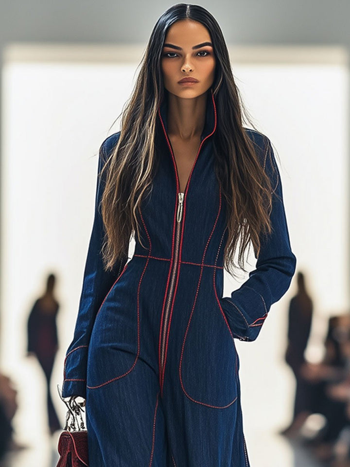 Model wearing a dark blue wide leg jumpsuit with zip front, showcasing its elegant and versatile design.