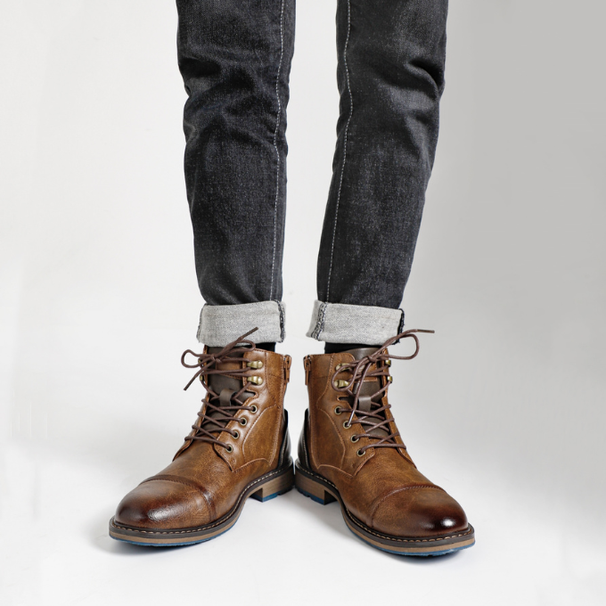 Close-up: Men's Bayshore dark brown side-zip boot, highlighting durable leather & rugged texture.