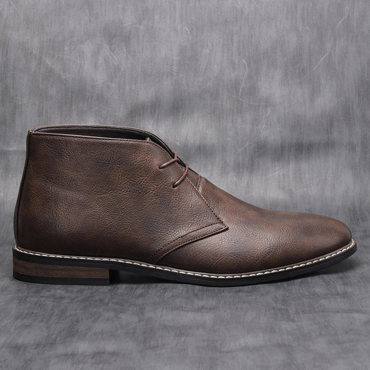 Versatile dark brown leather ankle boots, providing men with comfortable, rugged, and casual everyday style.